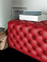 Alcide ottoman in red leather